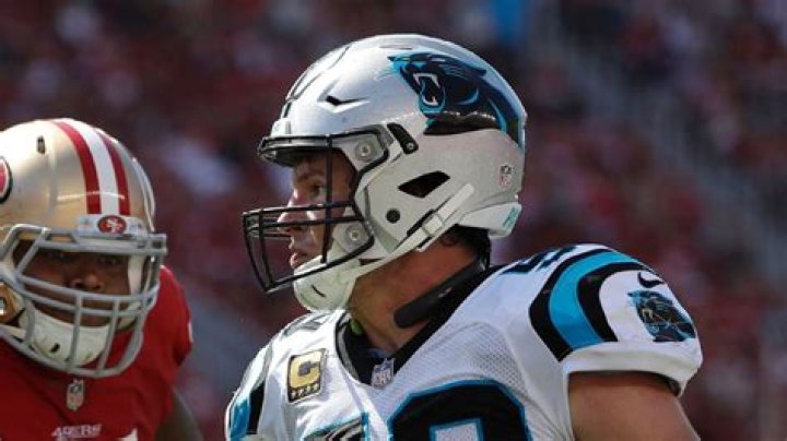 What Does Luke Kuechly Wear Around His Neck?